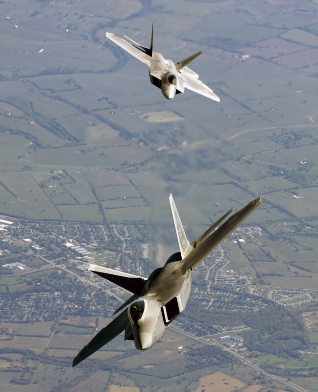 Two fighter jets in flight