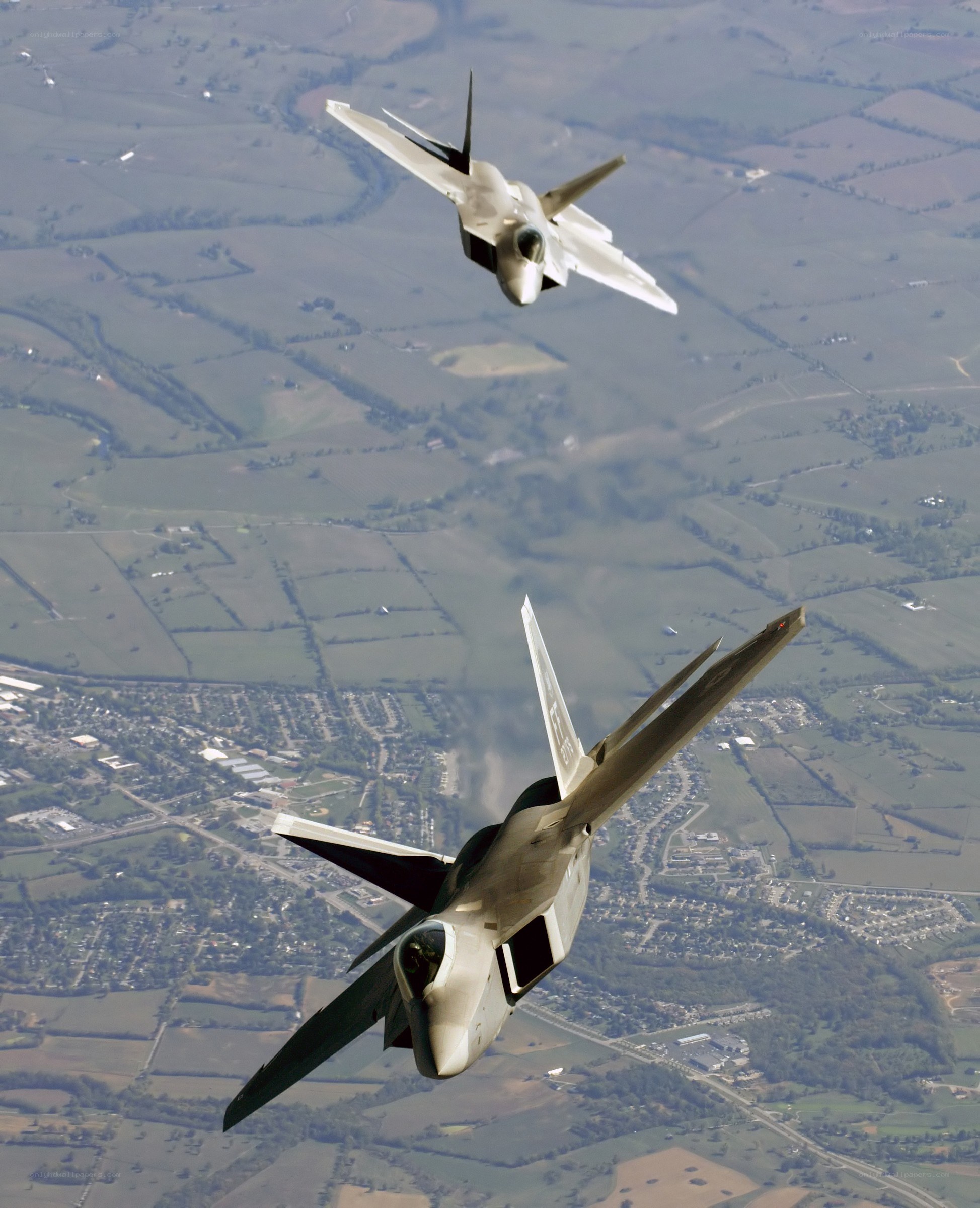 Two fighter jets in flight