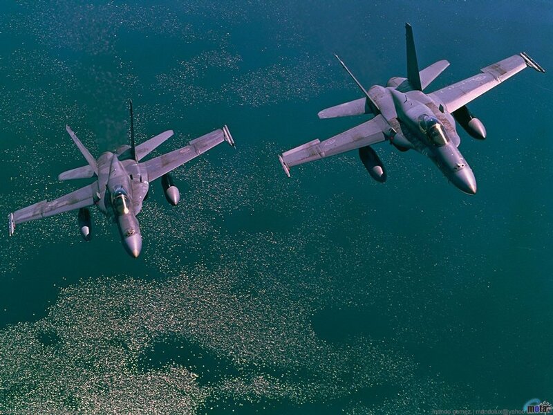 Two fighter jets in flight