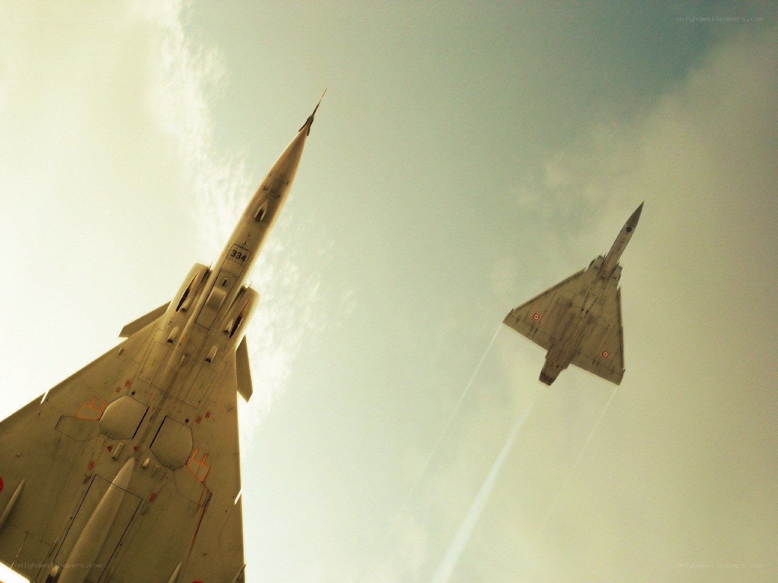 Two fighter jets in flight