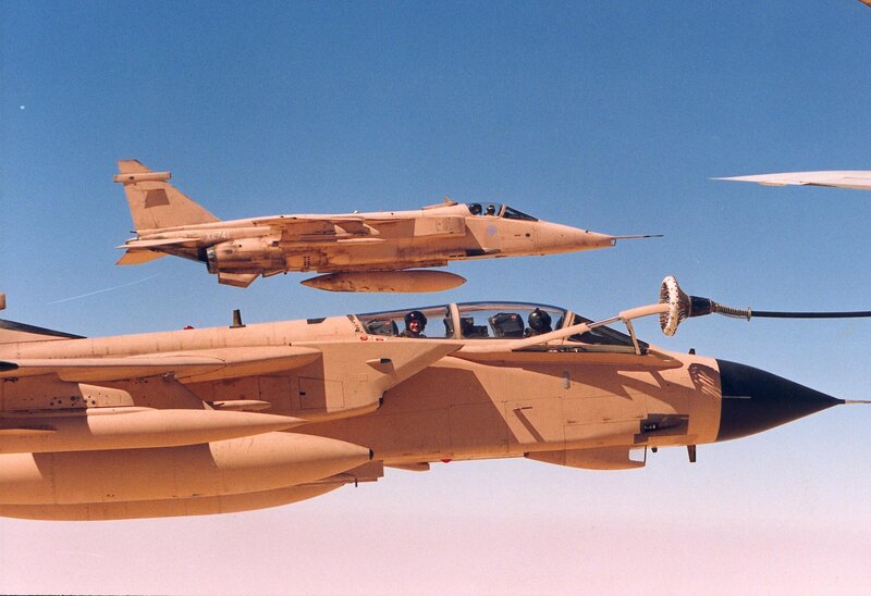 Two fighter jets in flight