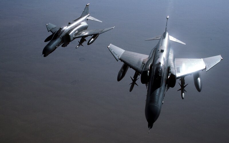 Two fighter jets in flight