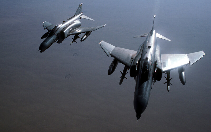 Two fighter jets in flight