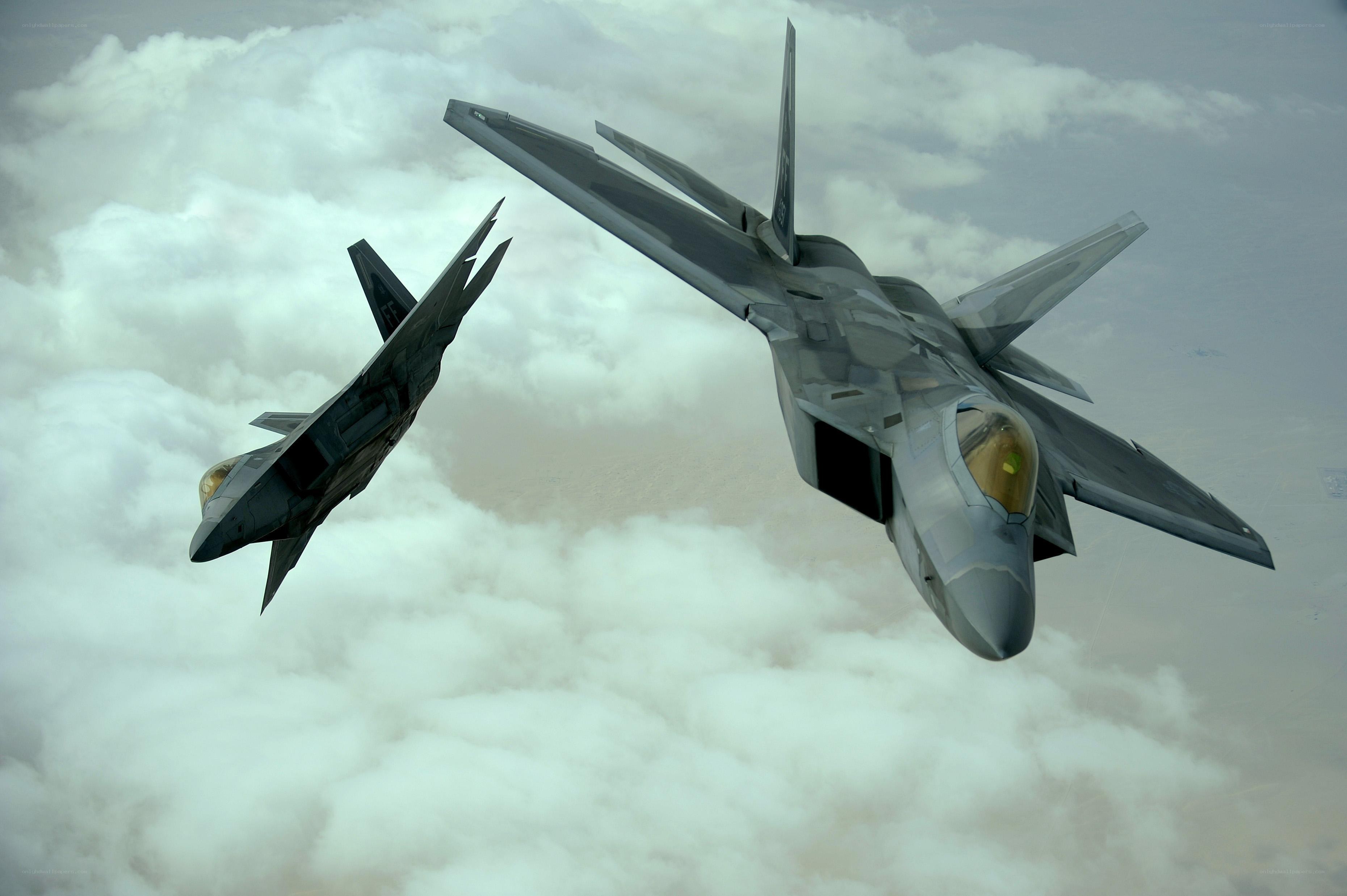 Two fighter jets in flight