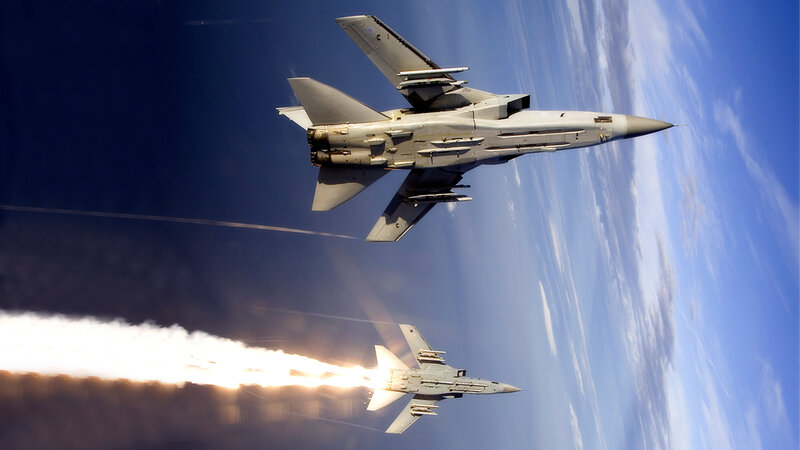 Two fighter jets in flight