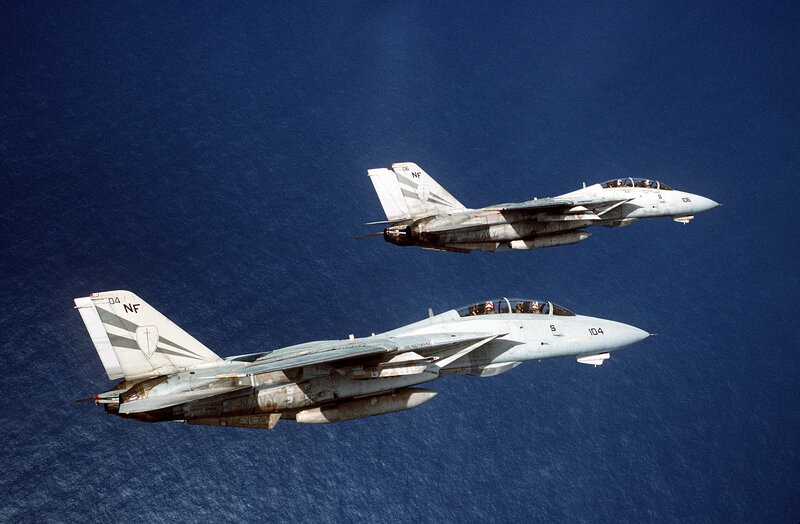 Two fighter jets in flight