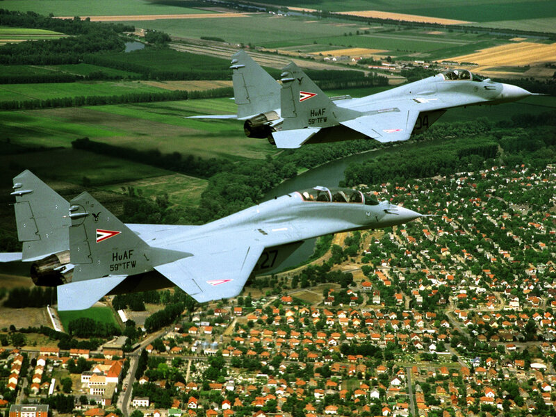 Two fighter jets in flight