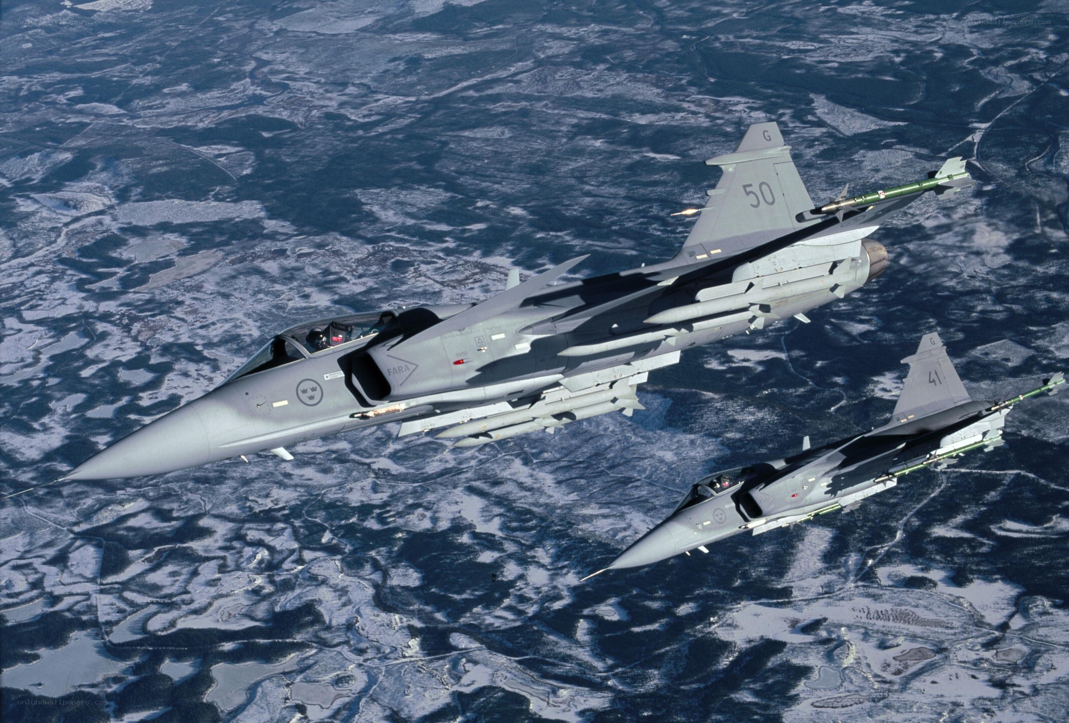 Two fighter jets in flight