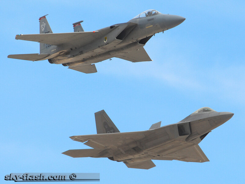 Two Fighter Jets in Flight — Blue, Clear