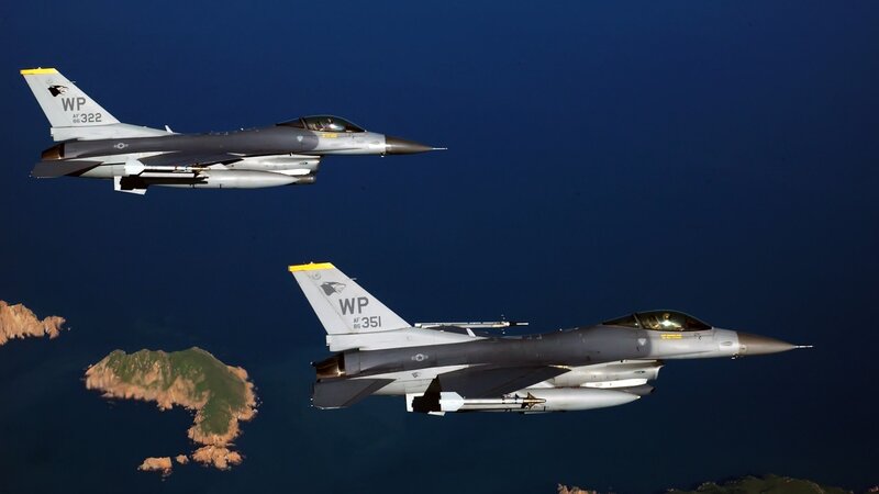 Two Fighter Jets in Flight — Blue, Dramatic, Afternoon, Photograph, Aircraft, Islands, Ocean, Gray