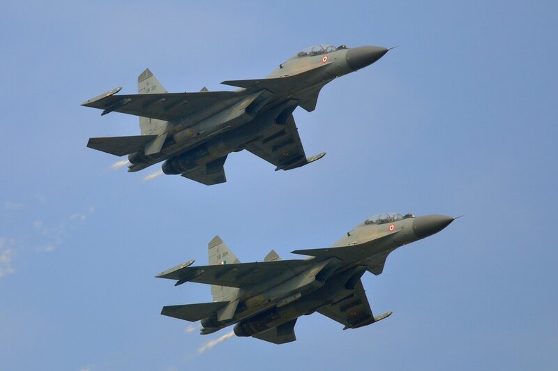Two Fighter Jets in Flight — Blue, Dynamic, Afternoon, Photograph, Aircraft, Sky, Exhaust