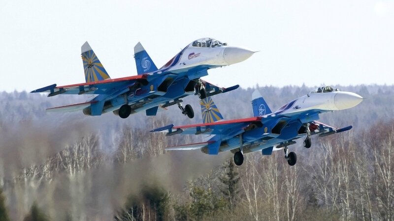 Two Fighter Jets in Flight — Blue, Dynamic, Winter