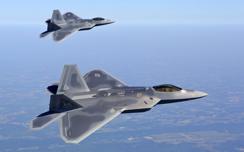 Two Fighter Jets in Flight — Gray, Calm, Afternoon, Photograph, Aircraft, Sky, Ground