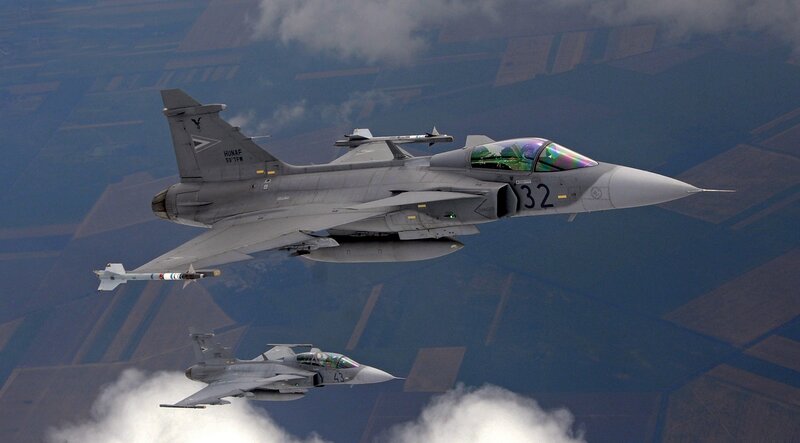Two Fighter Jets in Flight — Gray, Dramatic, Afternoon, Photograph, Aircraft, Clouds, Ground