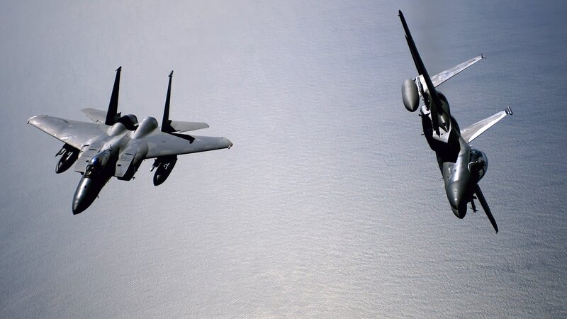 Two Fighter Jets in Flight — Gray, Dramatic, Afternoon, Photograph, Aircraft, Ocean