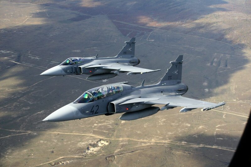 Two Fighter Jets in Flight — Gray, Dramatic, Afternoon, Photograph, Aircraft, Sky, Ground, Brown