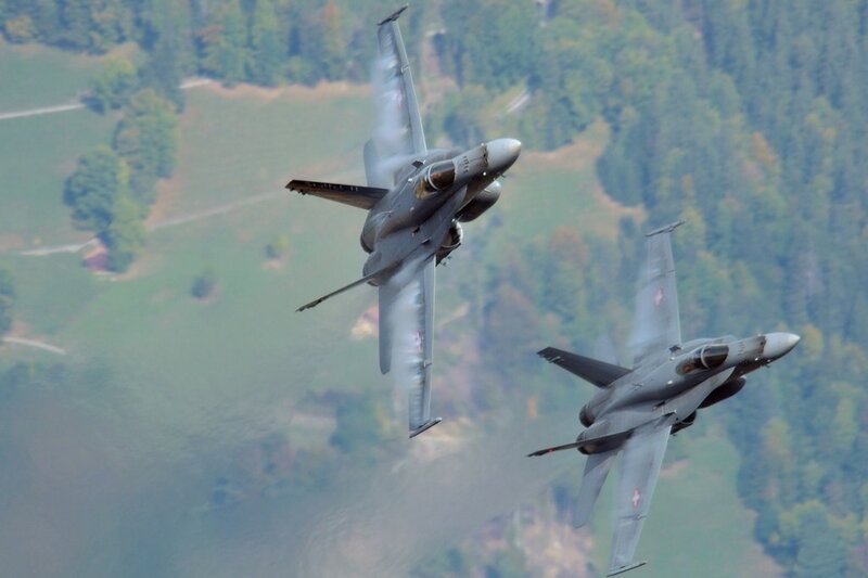 Two Fighter Jets in Flight — Gray, Dynamic, Afternoon, Photograph, Aircraft, Mountains, Trees