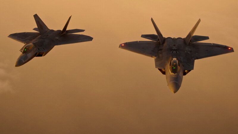 Two Fighter Jets in Flight — Orange, Dramatic