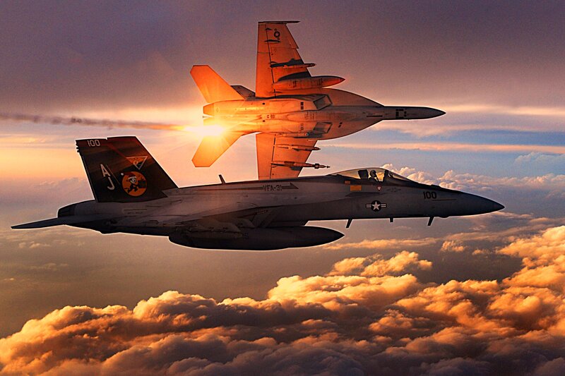 Two Fighter Jets in Flight — Orange