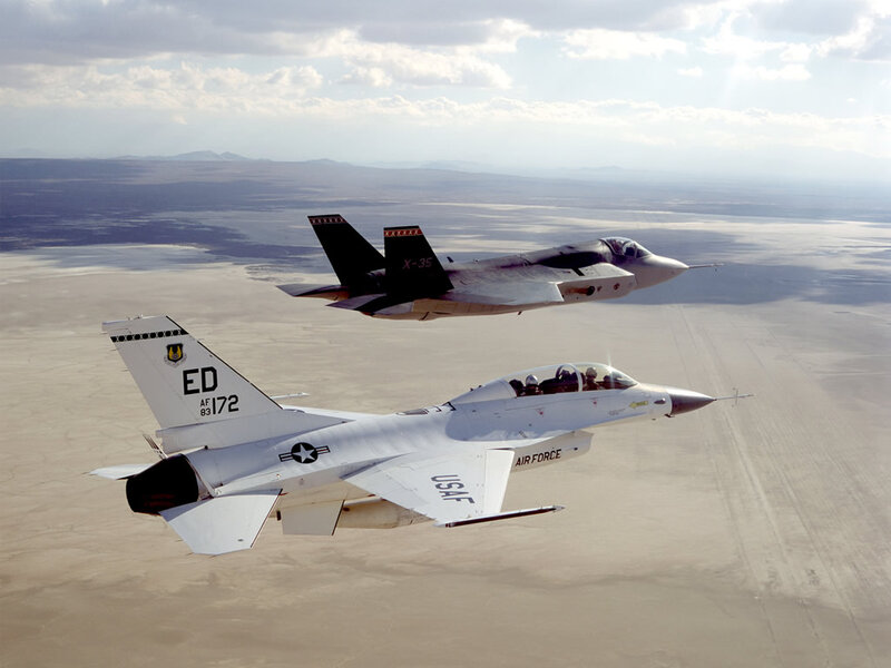 Two Fighter Jets in Flight — White