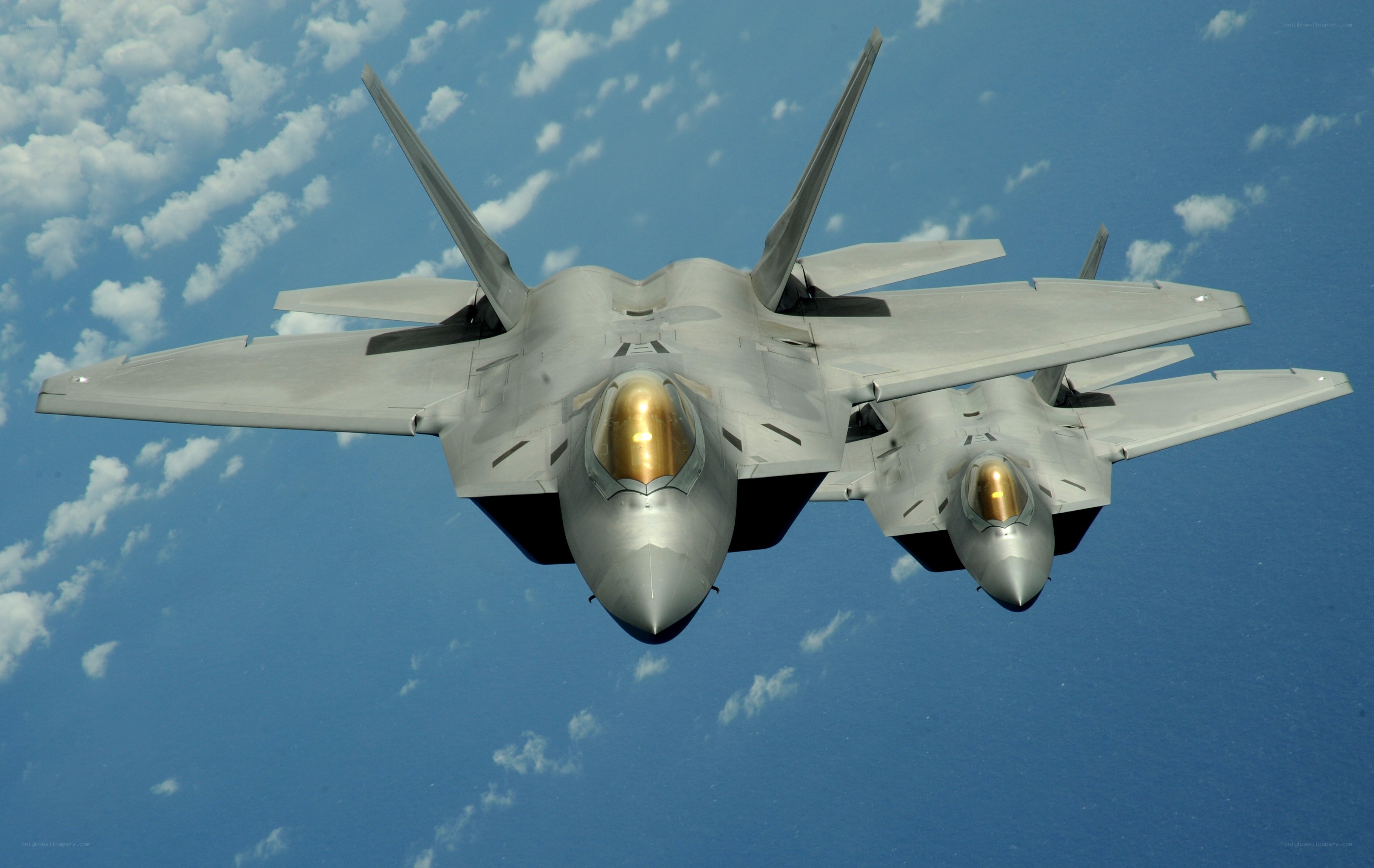 Two fighter jets in formation