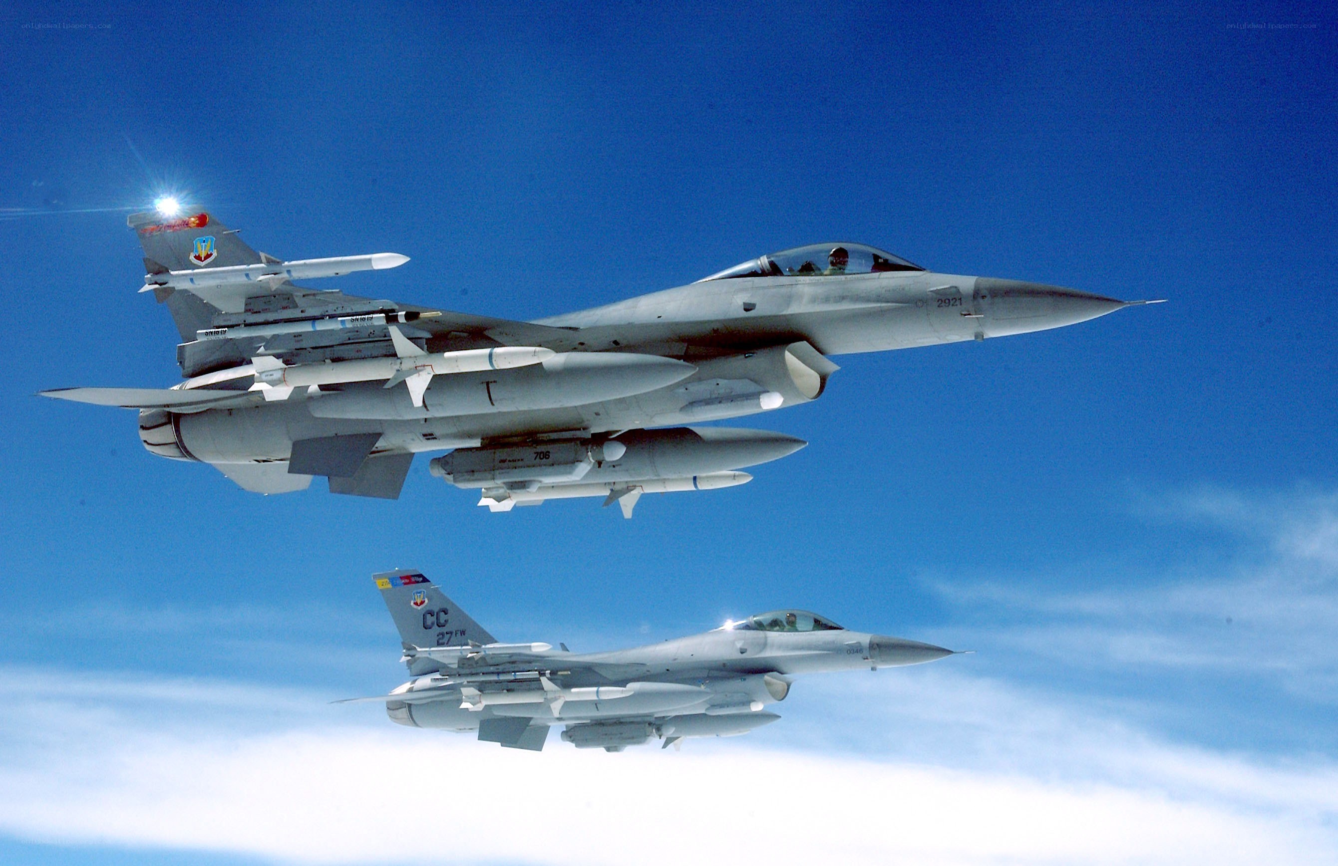 Two fighter jets in formation