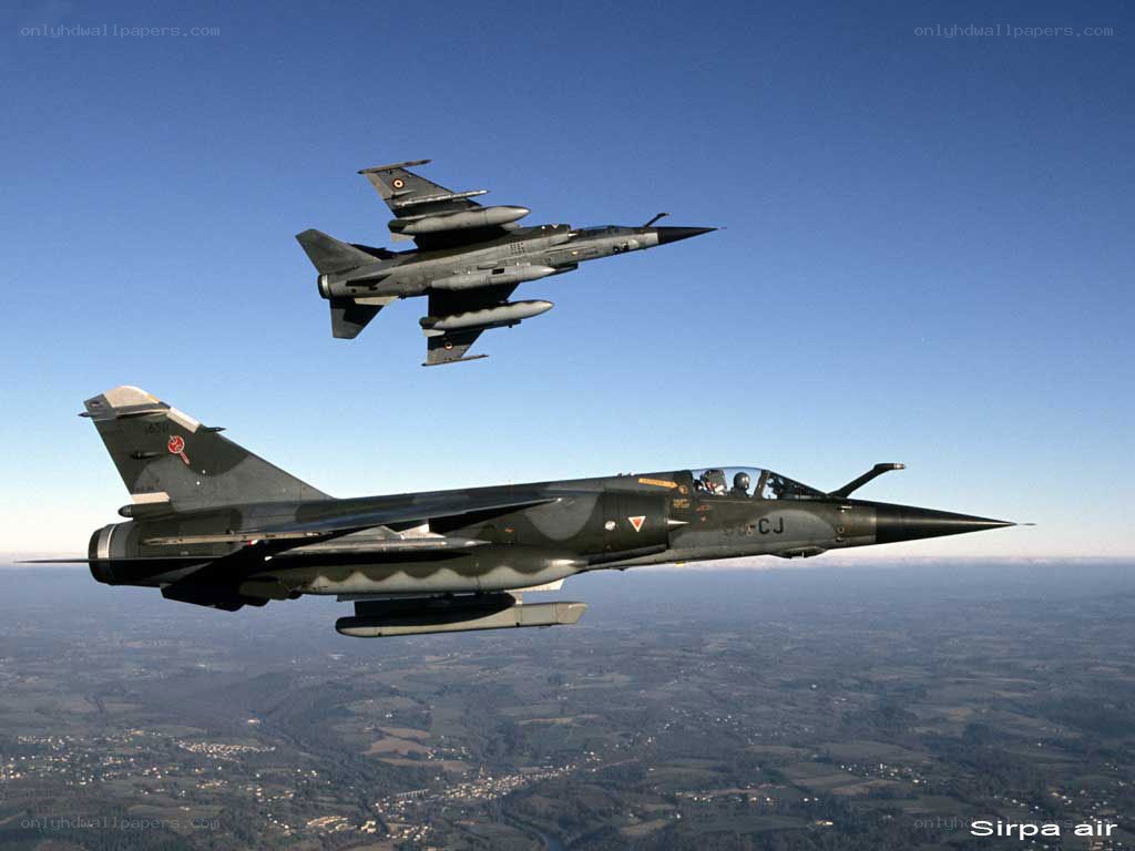 Two fighter jets in formation