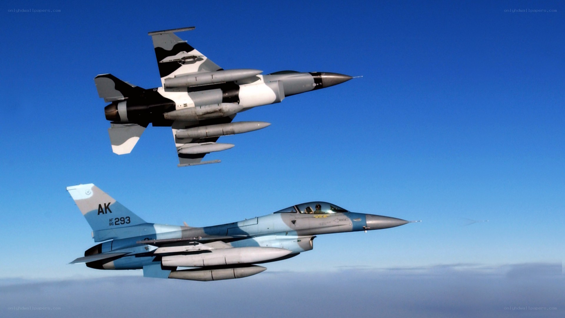Two fighter jets in formation