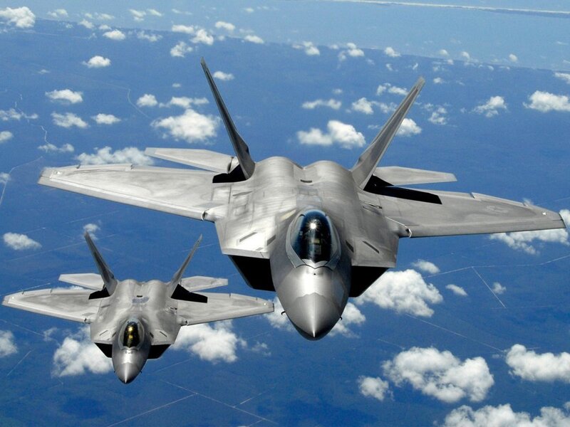 Two fighter jets in formation