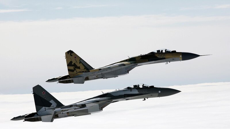 Two fighter jets in formation