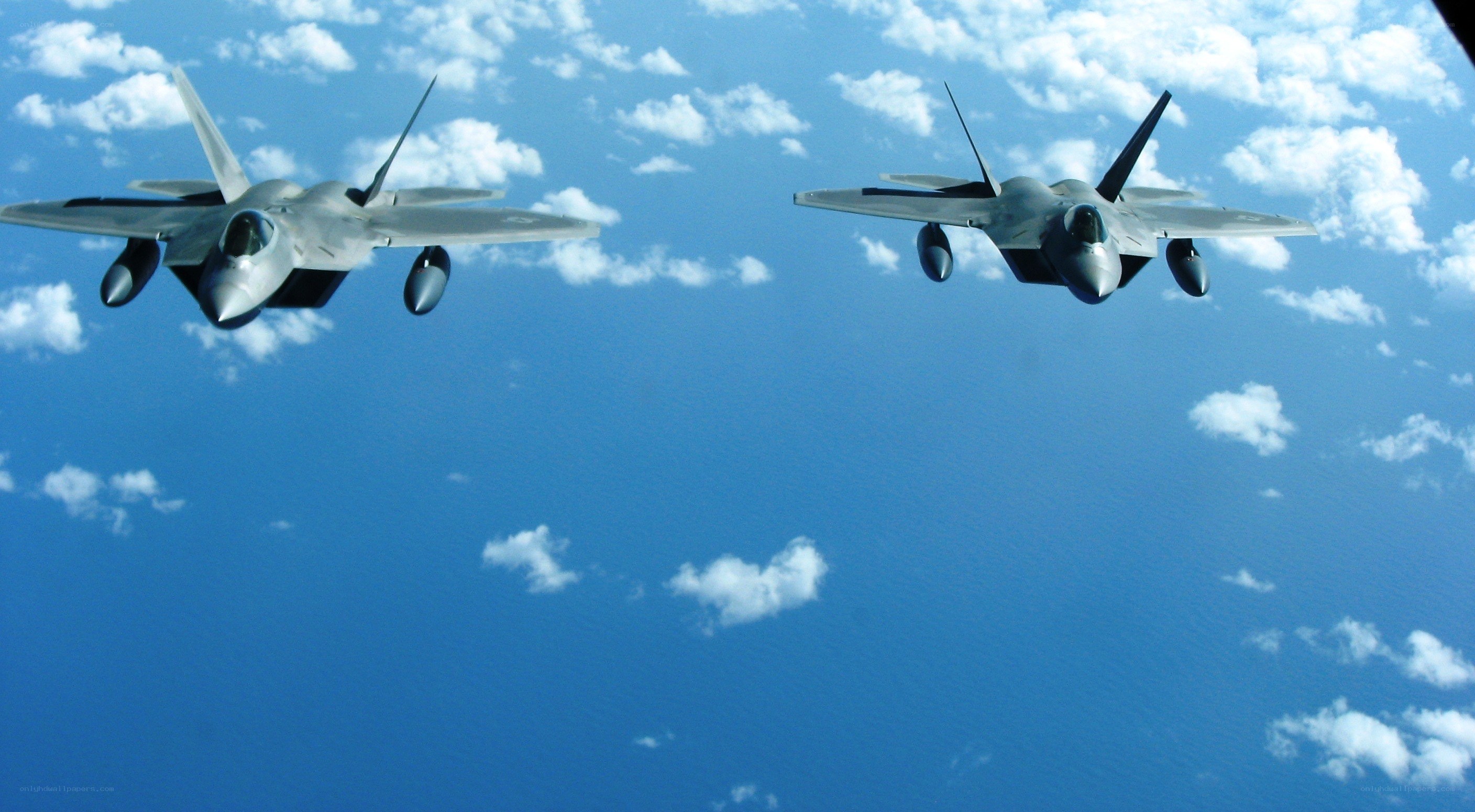Two fighter jets in formation