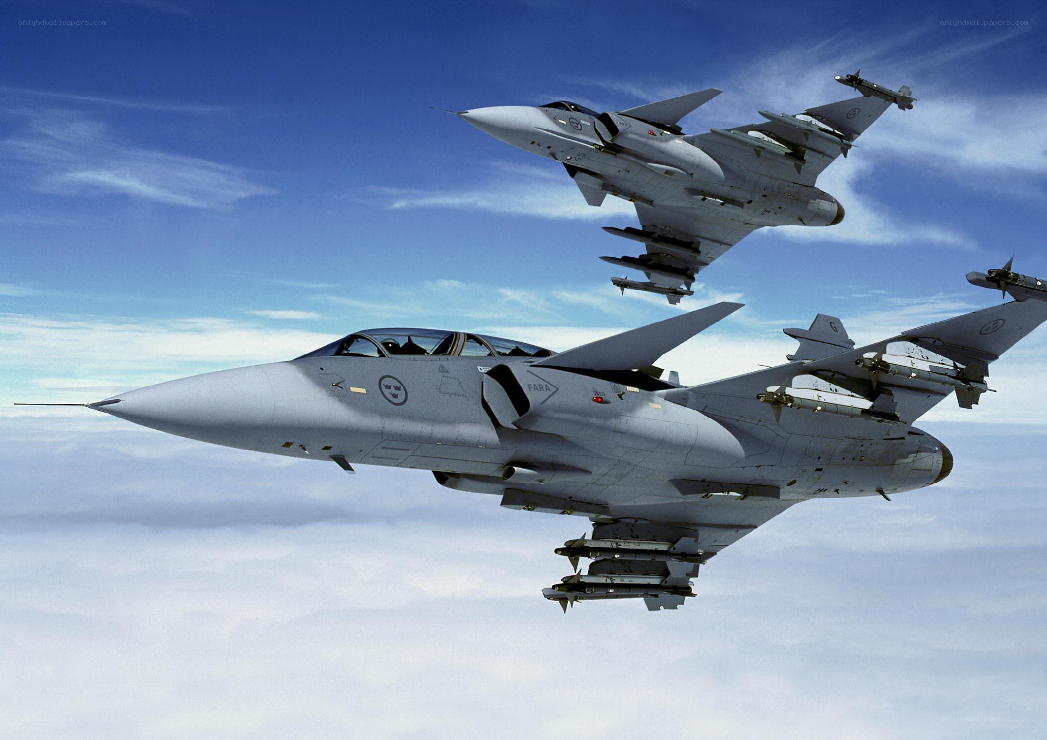Two fighter jets in formation