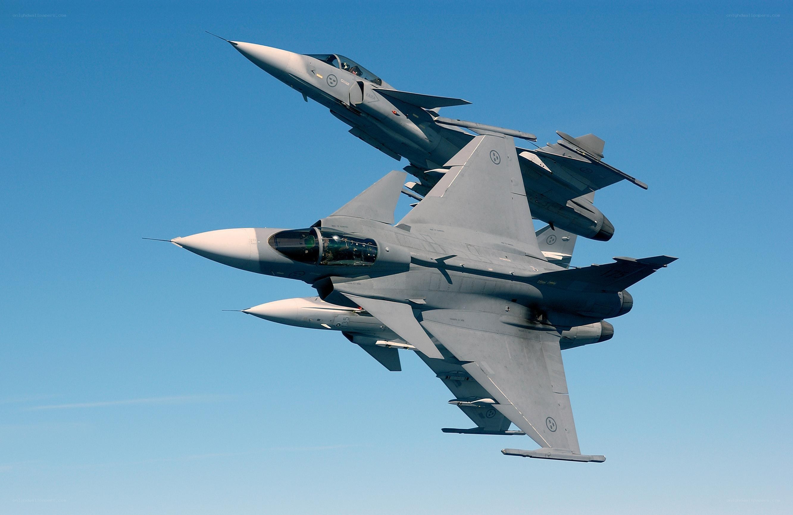 Two fighter jets in formation