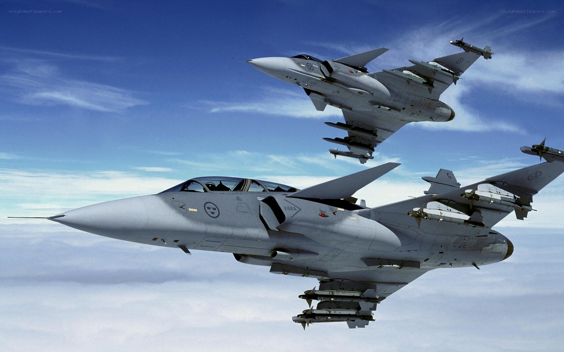 Two fighter jets in formation