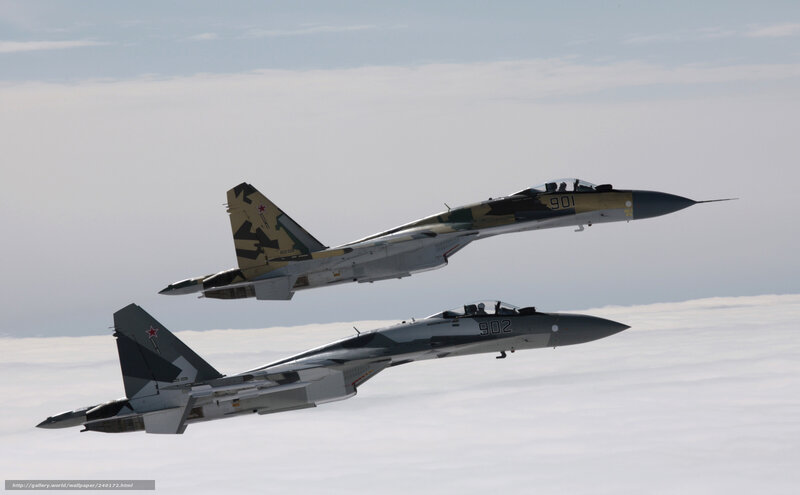 Two fighter jets in formation