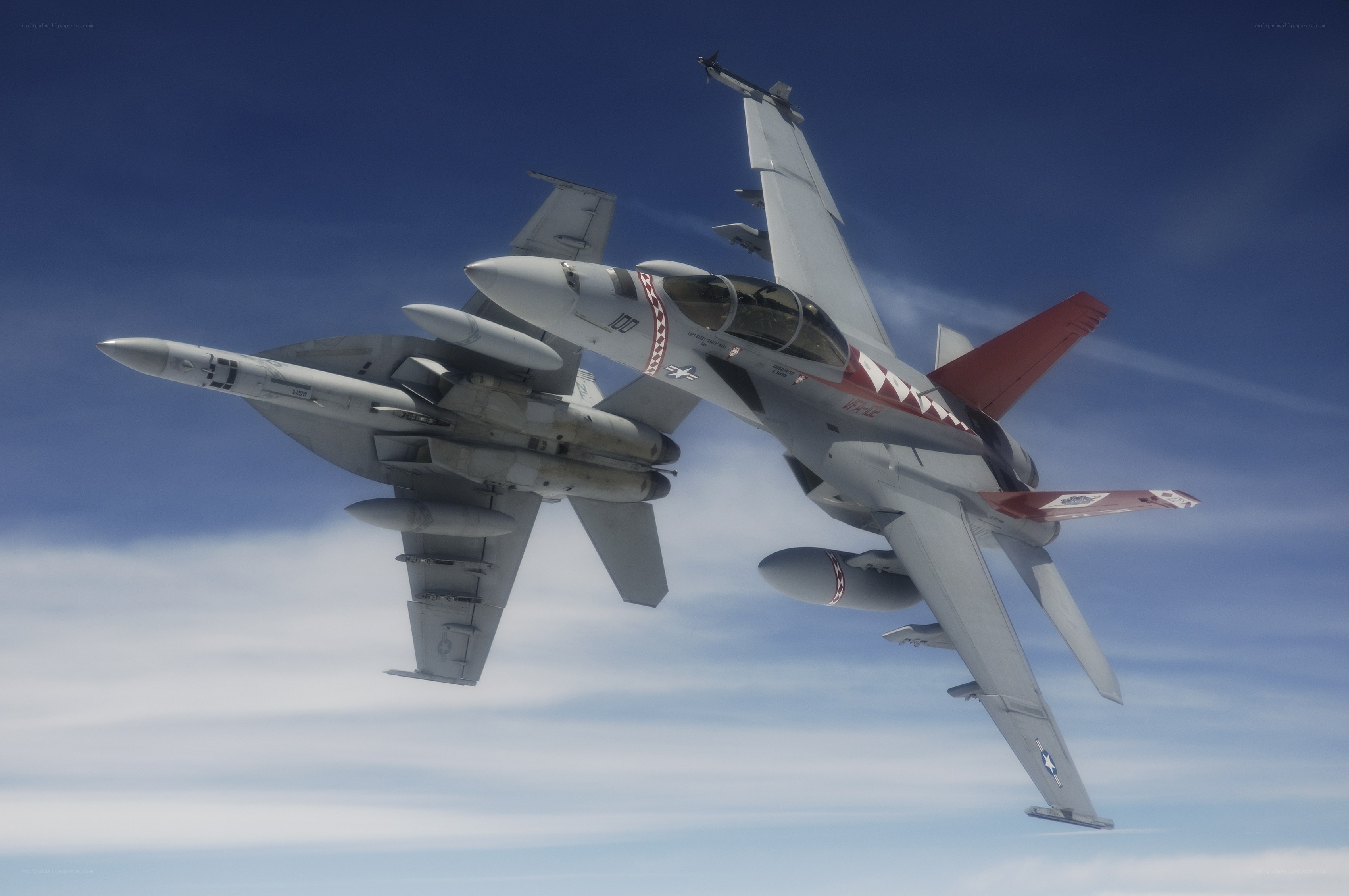 Two fighter jets in formation