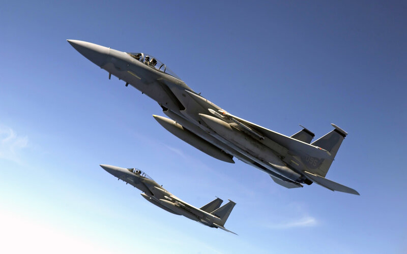 Two fighter jets in formation