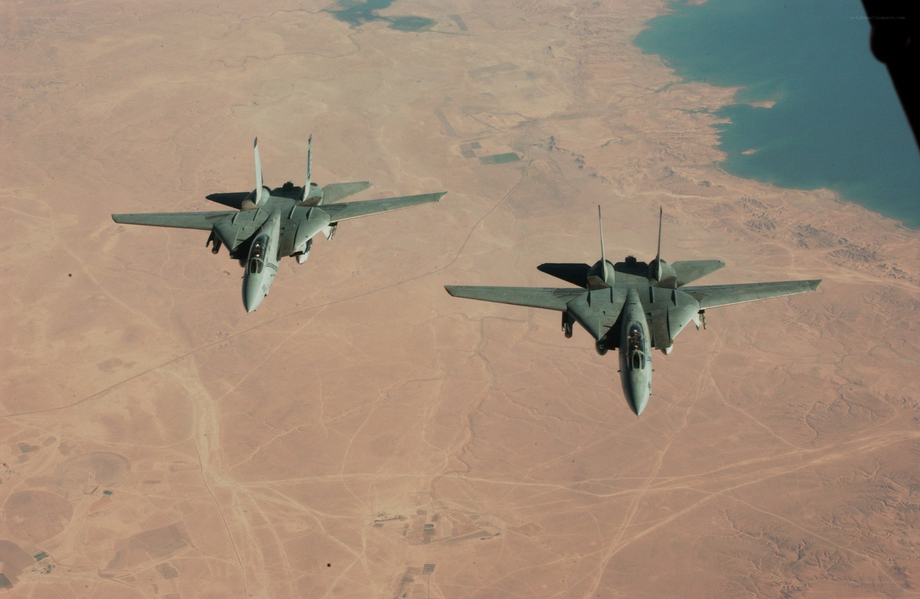 Two fighter jets in formation