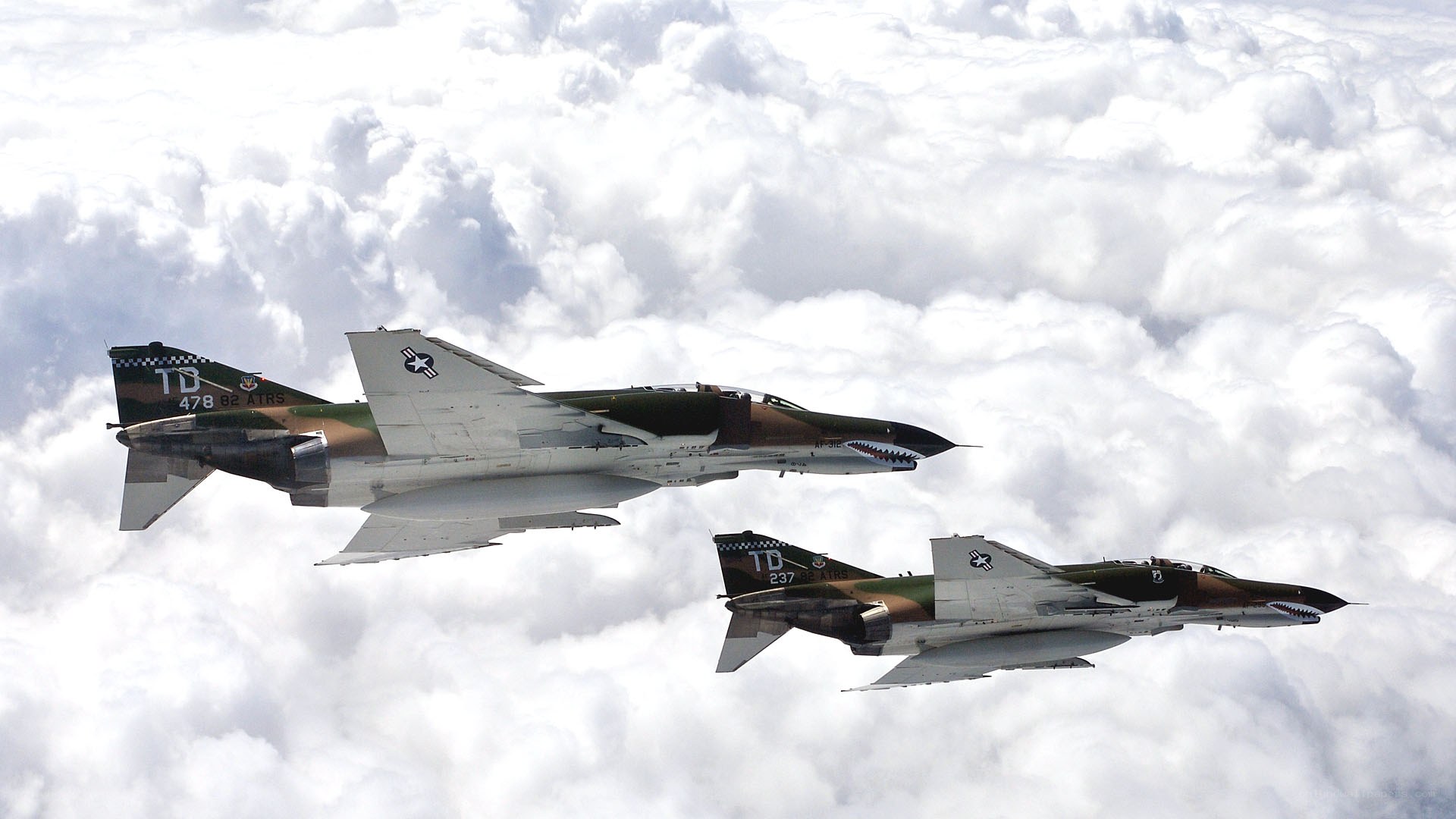 Two fighter jets in formation