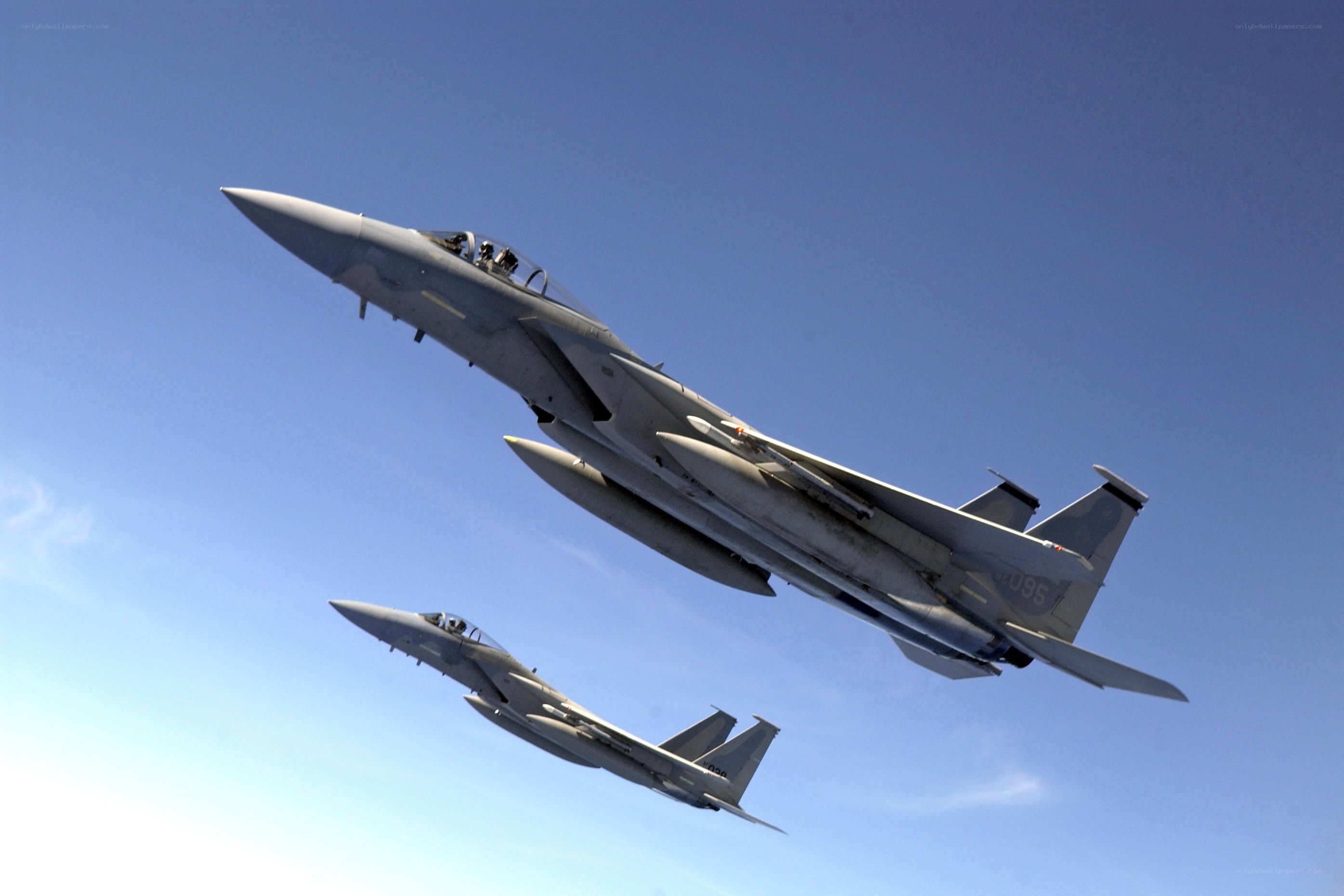 Two fighter jets in formation
