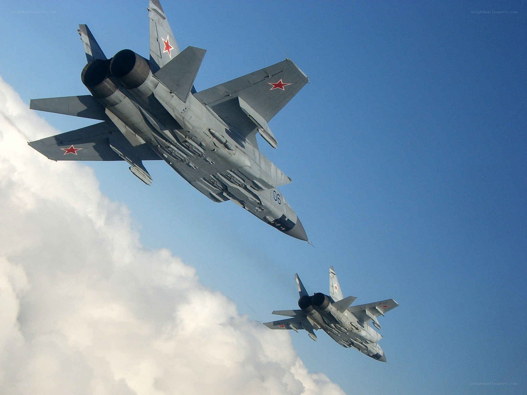 Two fighter jets in formation