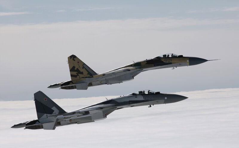 Two fighter jets in formation