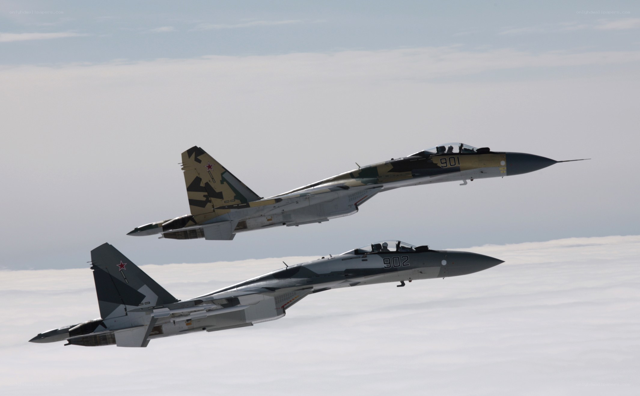 Two fighter jets in formation
