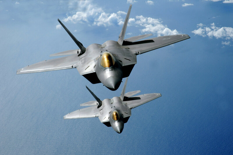 Two fighter jets in formation