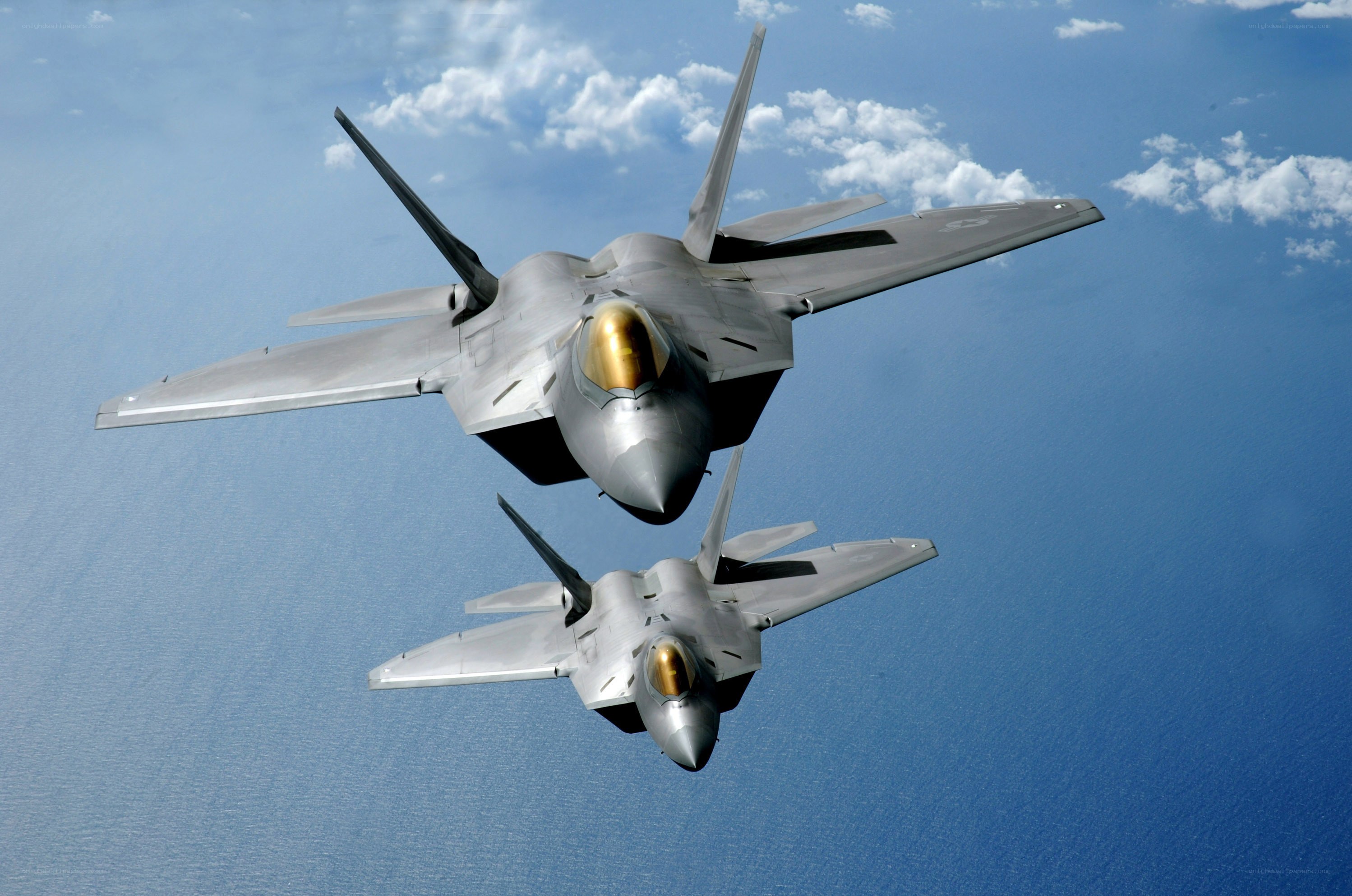 Two fighter jets in formation
