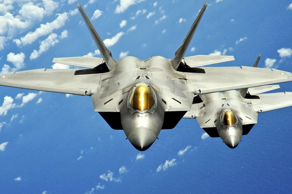 Two fighter jets in formation