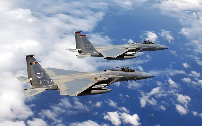 Two fighter jets in formation