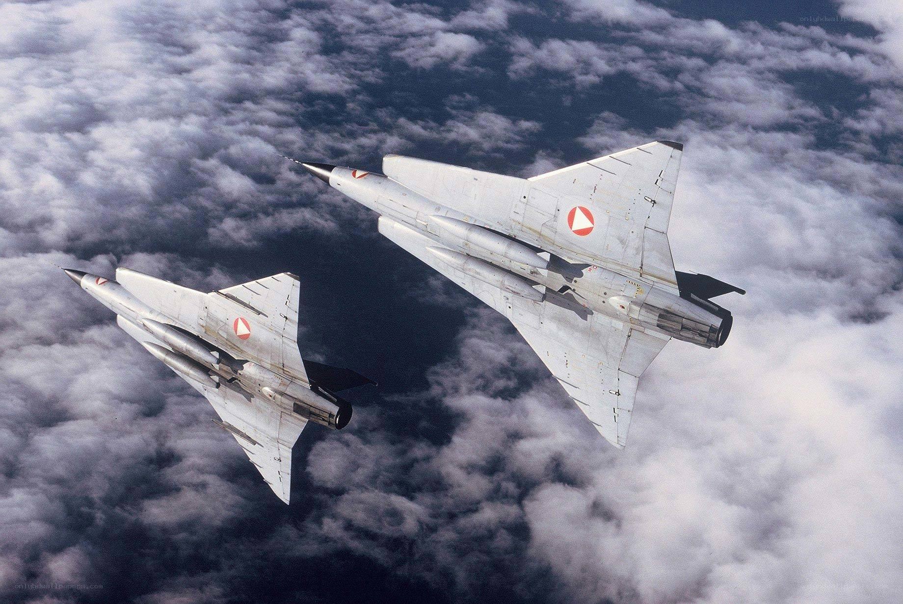 Two fighter jets in formation