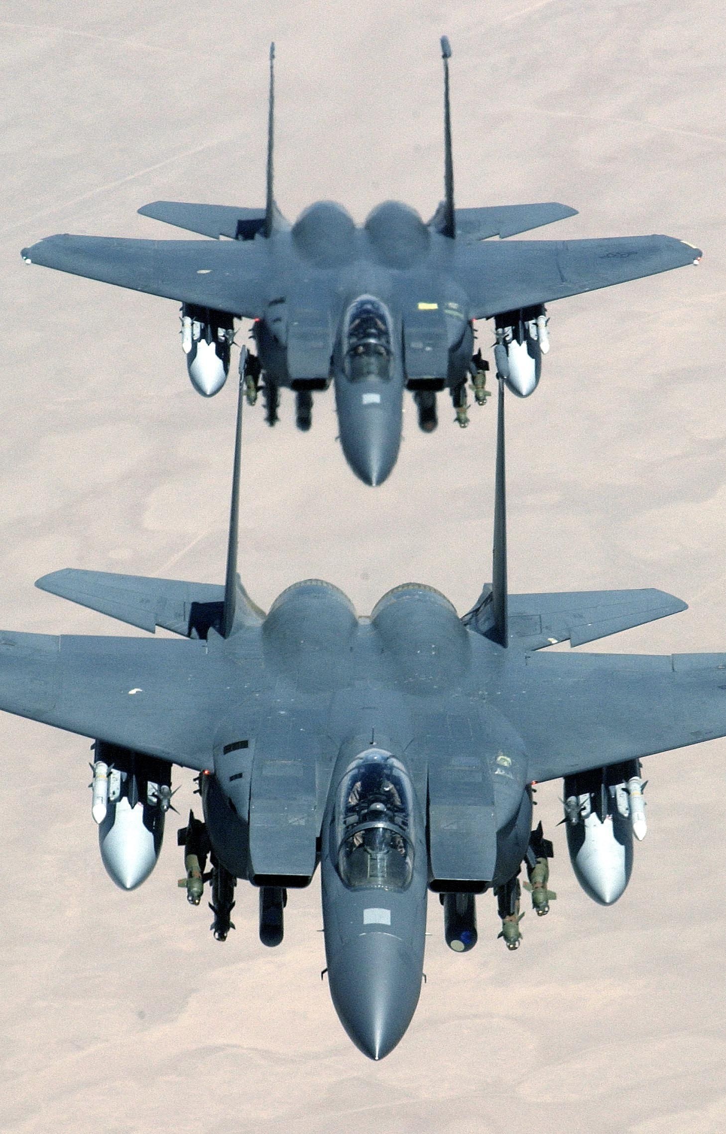 Two fighter jets in formation