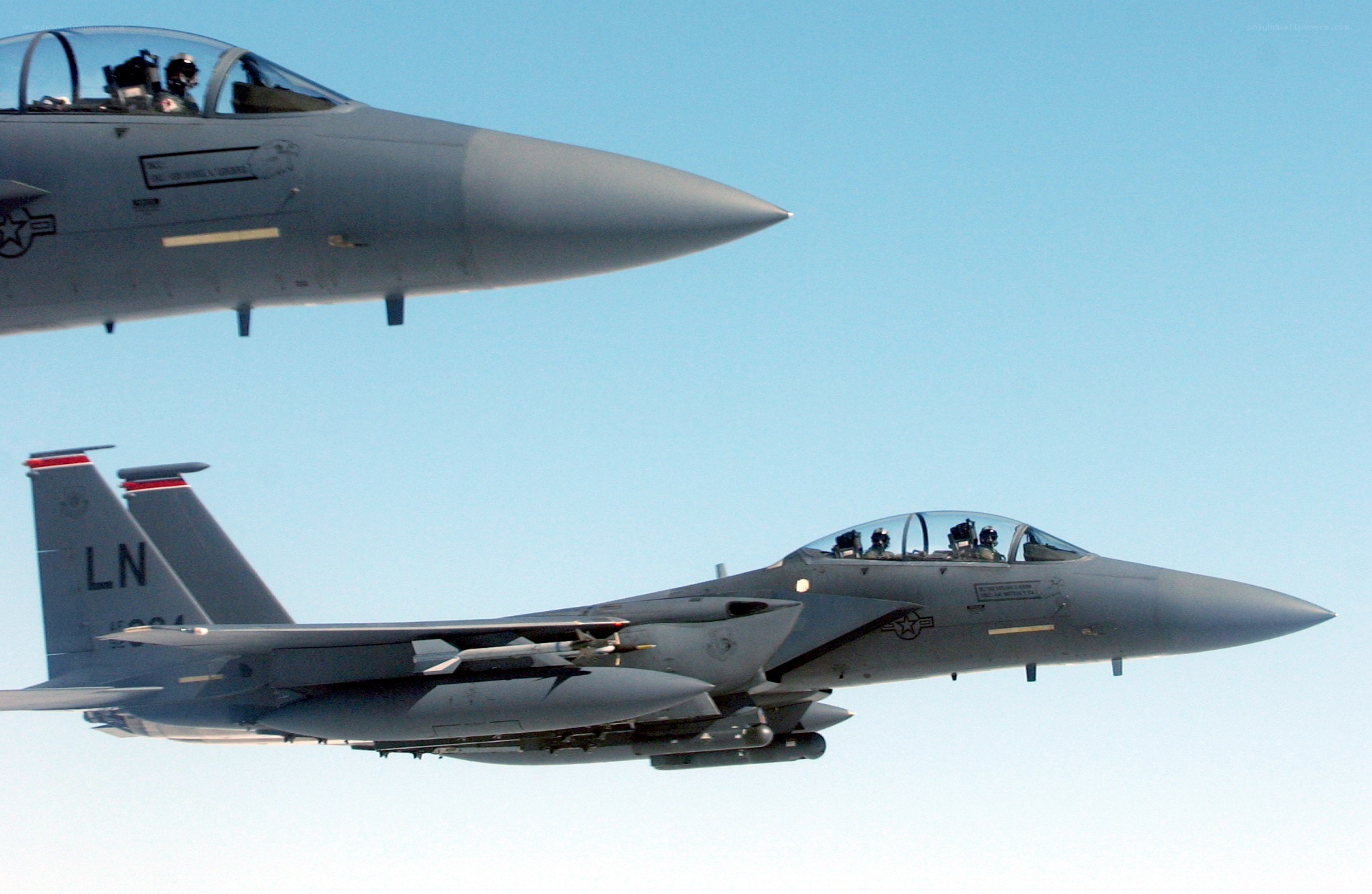 Two fighter jets in formation
